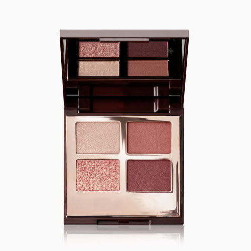 contains eyeshadow palette with four matte and shimmery pink shades
